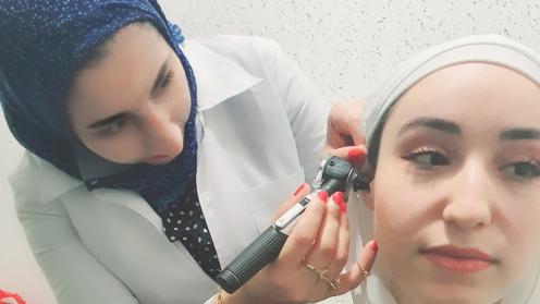Safa Alqudah working as an audiologist
